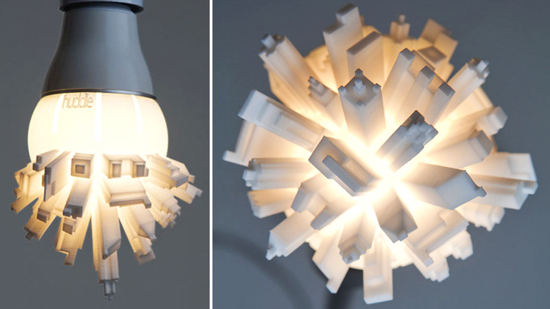 Illustration for article titled Mini Metropolis Bulb: Light Your Room With Softly Glowing Skyscrapers
